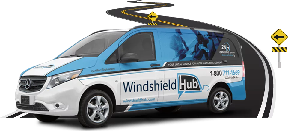 A blue and white van with Windshield Hub branding is shown on a winding road with yellow caution signs. The van has the company's contact number 1 800 711 1669 and advertises 24 7 services with certified 
